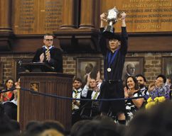 2025 Dux Taejeong Kim is congratulated at the annual Prizegiving ceremony
