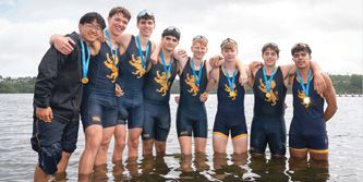 Rowing crew on the water